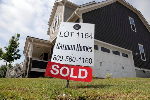 FILE - In this June 9, 2015, file photo, a sold sign is displayed in the yard of a newly-built home in the Briar Chapel community in Chapel Hill, N.C. On Tuesday, Nov. 29, 2016, the Standard & Poor's CoreLogic Case-Shiller 20-city home price index is released for September 2016. (AP Photo/Gerry Broome, FIle)