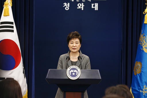 South Korean President Park Geun-hye makes a live televised address in Seoul, South Korea, Tuesday, Nov. 29, 2016. The embattled president said Tuesday that she will resign her office once parliament develops a plan for a safe transfer of power. (Pool Photo via AP)