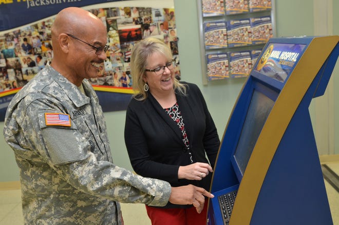 A military patient uses an ICE kiosk at Naval Hospital Jacksonville to give feedback on his care.