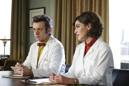 In this image released by Showtime, Michael Sheen portrays Dr. William Masters, left, and Lizzy Caplan portrays Virginia Johnson in a scene from the original series, "Masters of Sex." Showtime said Wednesday, Nov. 30, 2016, that “Masters of Sex” is at an end after four seasons.  (Warren Feldman/Showtime via AP)