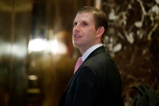 Eric Trump, son of President-elect Donald Trump, waits for an elevator in the lobby of Trump Tower, Wednesday, Nov. 30, 2016, in New York. (AP Photo/Evan Vucci)