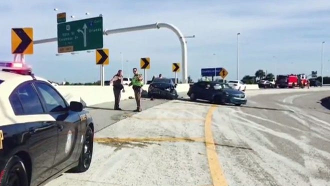 A man in Tampa is in critical condition after falling 33 feet off a highway (WFLA video)