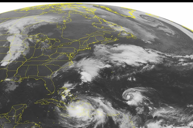 This NOAA satellite image taken Wednesday, Oct. 5, 2016 shows Hurricane Matthew ust north of eastern portions of Cuba. (NOAA/Weather Underground via AP)