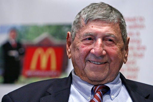 FILE - In this Aug. 21, 2008, file photo, Big Mac creator Michael “Jim” Delligatti attends his 90th birthday party in Canonsburg, Pa. Delligatti, the Pittsburgh-area McDonald’s franchisee who created the Big Mac in 1967, has died. He was 98. (Gene J. Puskar / The Associated Press)