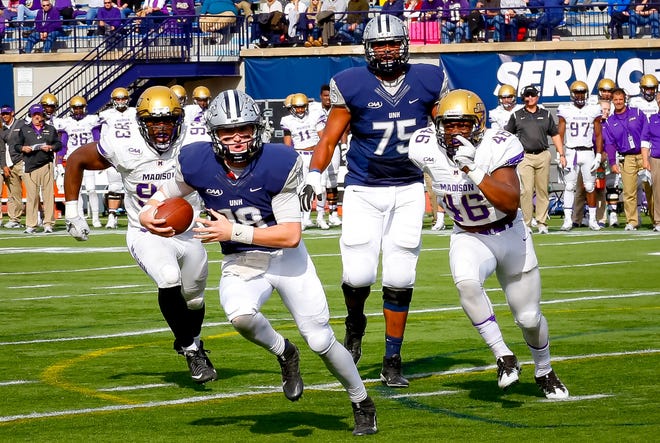 Quarterback Trevor Knight, pictured here during New HampshireþÄôs 42-39 regular-season loss to James Madison at Wildcat Stadium, will start in Saturday's playoff rematch if he's '100 percent healthy' from his ankle injury, coach Sean McDonnell said this week.
Photo by Shawn St. Hilaire/Fosters.com