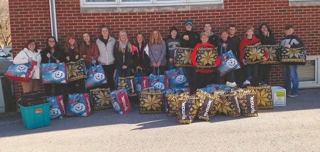 The group that went to Des Moines to deliver was composed of, from left to right, Brittney Swanson, Abby Catus, Alexis Kluender, Liz Fulk, Cadynce Mather, Trinity Stover, Quinn Thompson, Maya Baker, Blake Stover, Kale Krogh, Grant Anderson, Ashton Hermann, Peyton Elliot, Garrison Anderson, Draeden Lewis, Brendan DeMaris and Jace Krogh. Not pictured are Terri Anderson, Pastor Erick Swanson and Mandi DeMaris.