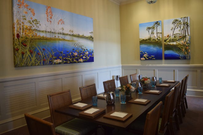 Justin Gaffrey's unique paintings hang on the walls of the Primrose Restaurant's private dining room. ANNIE BLANKS/THE LOG