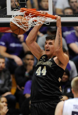 Wake Forest's Dinos Mitoglou dunks during the first half of a basketball game against Northwestern earlier this week. The Demon Deacons try to get back on the winning path today.