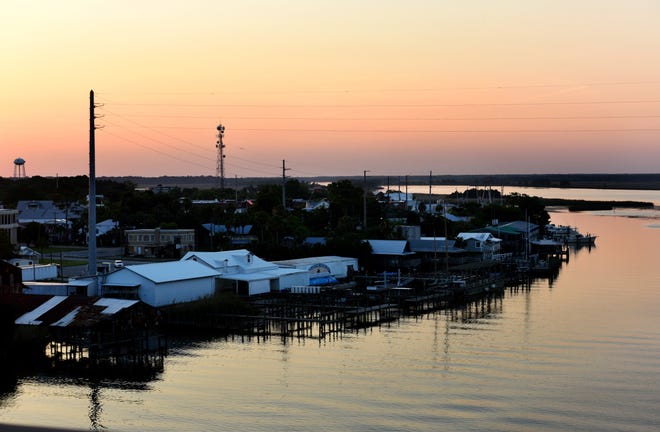 Seafood processing plants are seen in Apalachicola. The multistate water wars trial, pitting Alabama and Florida against Georgia, has concluded in Maine. TAIMY ALVAREZ/Sun Sentinel file via TNS