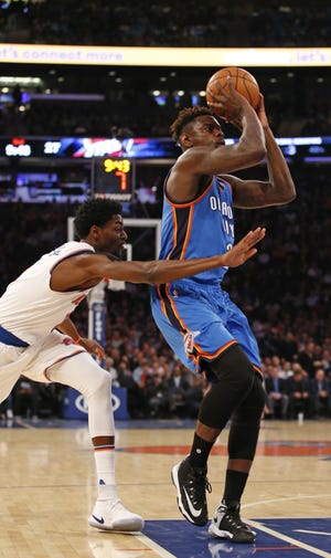 Oklahoma City Thunder guard Anthony Morrow (2) as New York Knicks Justin Holiday, left, defends in the second half of an NBA basketball game at Madison Square Garden in New York, Monday, Nov. 28, 2016. The Thunder defeated the Knicks 112-103. (AP Photo/Kathy Willens)