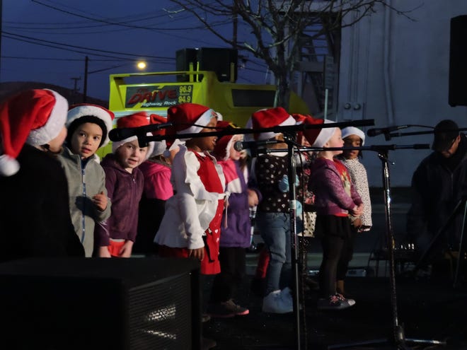 Mrs. Loretta's Tot Time students sing during the Route 66 Christmas Festival held in downtown Barstow Friday night. Mike Lamb, Desert Dispatch