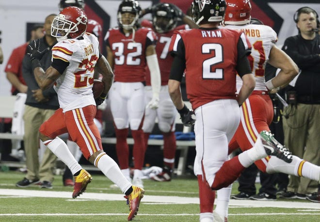 Kansas City Chiefs strong safety Eric Berry (29) runs back an intercepted ball from a Atlanta Falcons two-point conversion during the second half of their game Sunday in Atlanta. Photo by AP