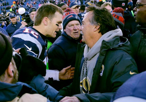 New England Patriots quarterback Tom Brady, left, and Los Angeles Rams head coach Jeff Fisher speak at midfield after after an NFL football game, Sunday, Dec. 4, 2016, in Foxborough, Mass. The Patriots won 26-10. (AP Photo/Elise Amendola)