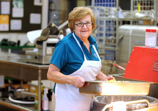 TIMES-REPORTER PAT BURK

Phyllis Willison prepares lunch for students at the Buckeye Career Center cafeteria in New Philadelphia. Willison is The Times-Reporter's Difference Maker for December.
