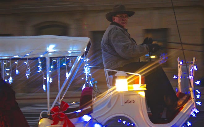 Carriage rides were available at Smith's Flowers Holiday Party Thursday night. ANDREW KING PHOTO