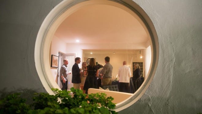 A port-hole view of the 1878 series reception Wednesday evening at 1221 North Lake Way. Courtesy of CAPEHART