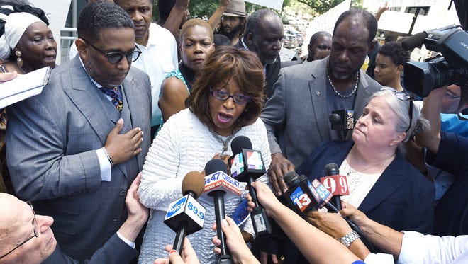 U.S. Rep. Corrine Brown talks to reporters and backers outside Jacksonville’s federal courthouse after being indicted in July.(Florida Times-Union/Bob Self)