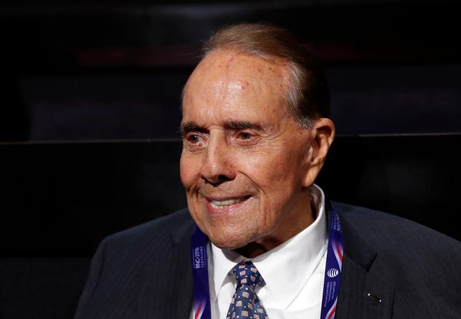 Former Republican presidential candidate Sen. Bob Dole arrives July 18 at the Republican National Convention in Cleveland. The New York Times is reporting that last week's telephone call between President-elect Donald Trump and Taiwan's president was the result of six months of behind-the-scenes work by Dole acting on behalf of the Taiwanese government.