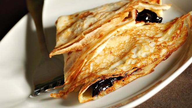 Swedish pancakes are like crepes. Sometimes they are folded up into triangles. (Dreamstime/TNS)