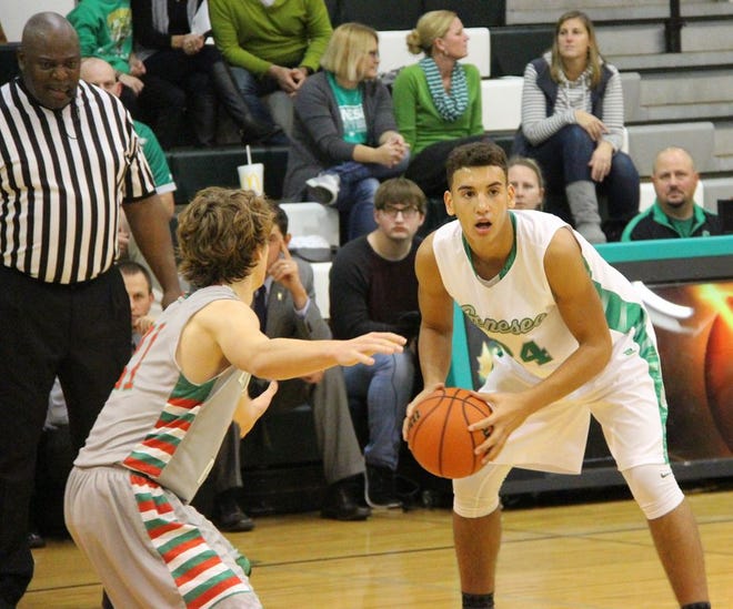 Isaiah Rivera, right, looks for a passing lane during Geneseo’s game against LaSalle-Peru.