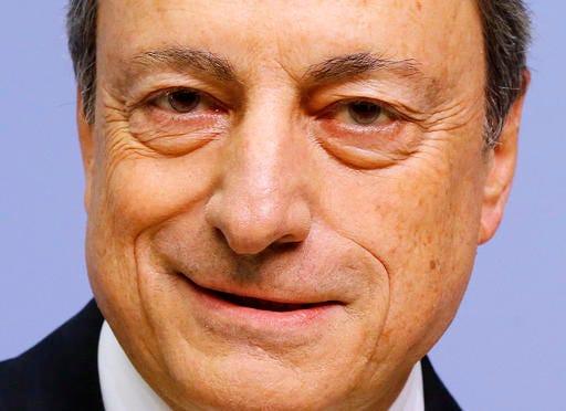 President of European Central Bank Mario Draghi poses at the beginning of a news conference in Frankfurt, Germany, Thursday, Dec. 8, 2016, following a meeting of the ECB governing council. (AP Photo/Michael Probst)