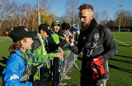In this Dec. 7, 2016, Seattle Sounders goalkeeper Stefan Frei greets fans after training in Tukwila, Wash. The Sounders are scheduled to face Toronto FC in the MLS Cup on Saturday, Dec. 10, 2016, in Toronto. (AP Photo/Ted S. Warren)