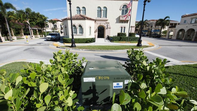 A standard “low boy” transformer box was installed outside Town Hall earlier this year to give residents an opportunity to see what the boxes look like. The transformer is hidden behind landscaping on three sides.