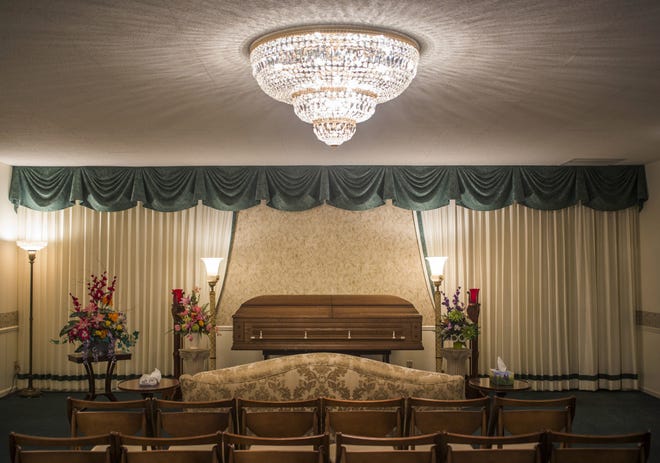 This Monday, Jan. 25, 2016 photo shows a room inside a funeral home in Saginaw, Mich. According to a study by the government released on Thursday, Dec. 8, 2016, life expectancy in the United States has fallen for the first time in more than 20 years. (Katy Kildee/The Saginaw News - MLive.com via AP)