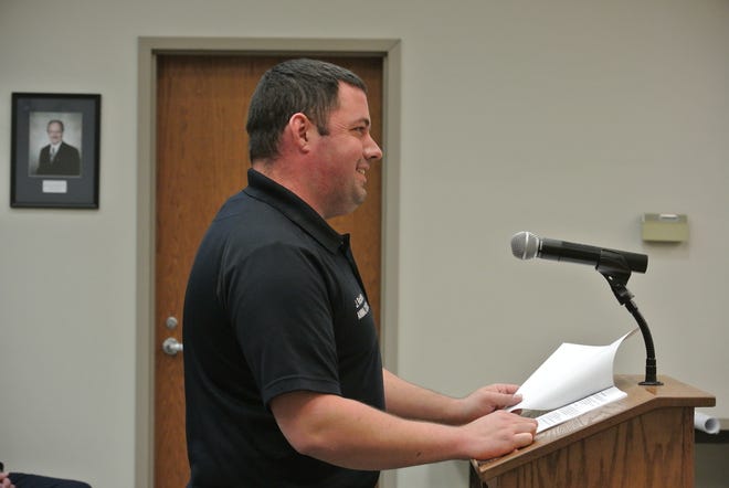 Greenwood Animal Control Officer Jerrod Ricketts answers questions from the Greenwood City Council during their regular meeting Tuesday, Dec. 6, 2016. THOMAS SACCENTE/TIMES RECORD