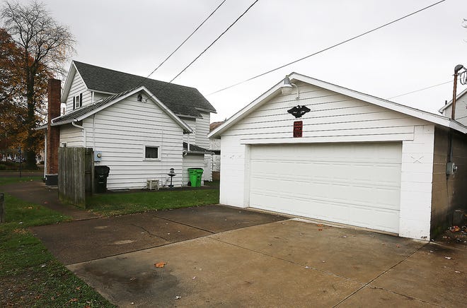 A view of the home and garage of Arlie D. Gooch at 609 E. Front St. in Dover. Officials say Gooch died from a blunt force trauma. His case remains unsolved.