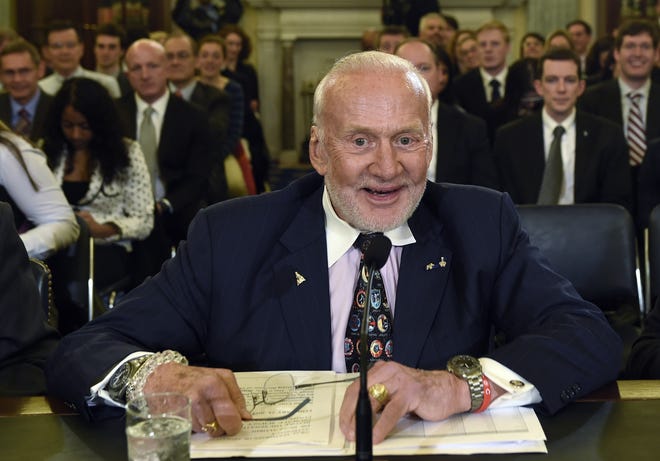 Buzz Aldrin, former NASA Astronaut and Apollo 11 Pilot, prepares to testify Feb. 24, 2015, on Capitol Hill in Washington before the Senate subcommittee on Space, Science, and Competitiveness hearing on human exploration goals and commercial space competitiveness. Aldrin has been discharged from the New Zealand hospital where he was transported for treatment after being evacuated from Antartica last week. AP File Photo/Susan Walsh