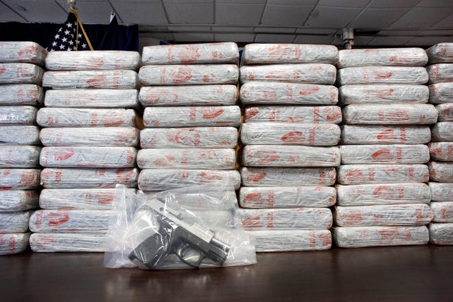 — AP file photo

This shows a firearm and 154 pounds of heroin worth at least $50 million displayed during a Drug Enforcement Administration news conference in New York. According to government data released Thursday, drug overdose deaths in the U.S. surpassed 50,000 in 2015, the highest mark in at least 15 years. (AP Photo/Mark Lennihan)