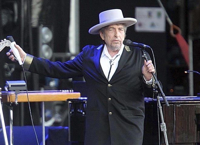 Bob Dylan performing inFrance in 2012. He was to be presented the Nobel Prize in Literature Saturday, but he declined to attend. AP PHOTO BY DAVID VINCENT