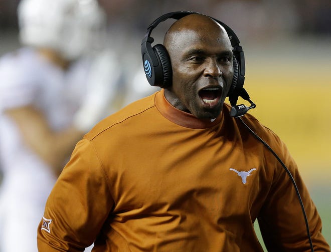 FILE - In this Saturday, Sept. 17, 2016, file photo, Texas coach Charlie Strong yells during the first quarter of an NCAA college football game against California in Berkeley, Calif. A person with direct knowledge of the decision tells The Associated Press that former Texas coach Strong has agreed to become the next coach at South Florida. The person spoke on condition of anonymity because the school was preparing a formal announcement for later Sunday, Dec. 11. (AP Photo/Ben Margot, File)