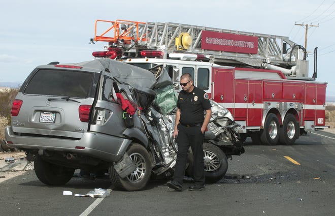 An SUV was struck by a semitrailer on Highway 395 in Victorville Friday. The highway was completely closed for extrication and investigation. James Quigg, Daily Press