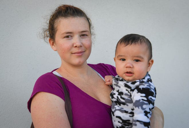 Marylola Turquiz with her 4-month-old son, Christian-Alczander Turquiz. Herald-Tribune staff photo / Rachel S. O'Hara