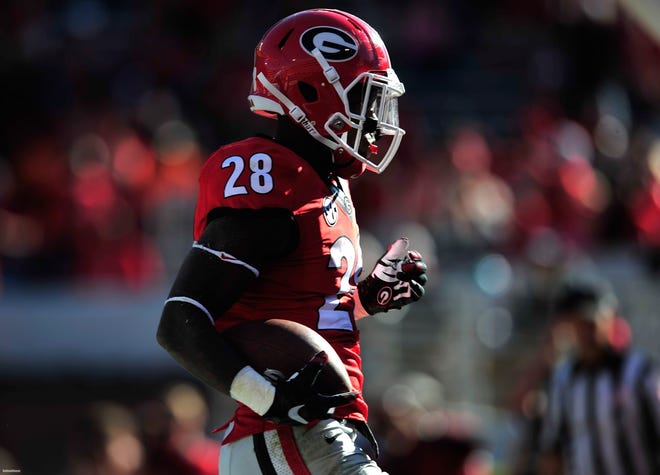 Georgia’s Shaquery Wilson scores a touchdown during the annual G-Day game on Saturday, April 16, 2016 in Athens, Ga. (Richard Hamm/Staff) OnlineAthens / Athens Banner-Herald