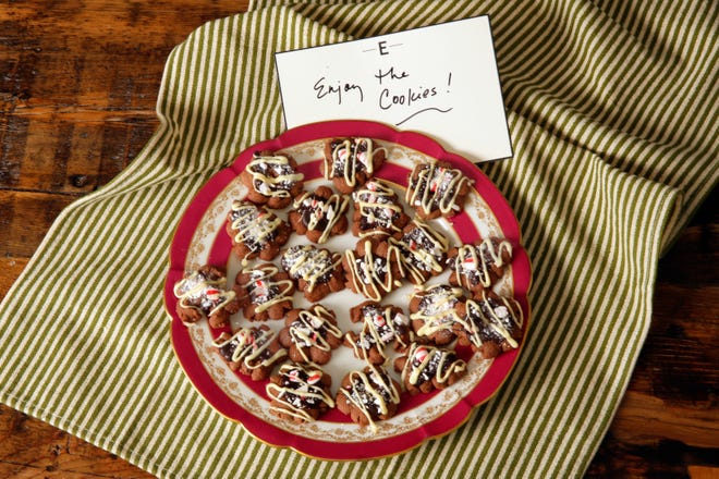 Peppermint Bark Spritz Cookies are shown, from a recipe by Elizabeth Karmel. (AP Photo/Richard Drew)
