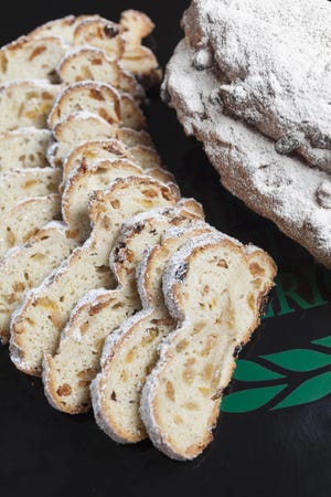 This stollen is from a recipe by the Culinary Institute of America. (Phil Mansfield/The Culinary Institute of America via AP)