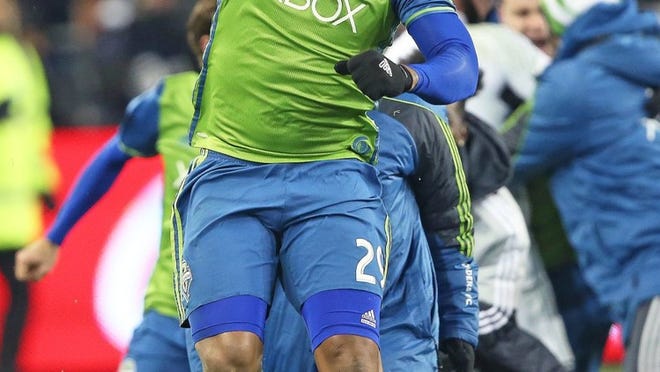 Roman Torres and the Seattle Sounders just celebrated their first MLS championship. Austin, meanwhile, can’t even get a pro team of any kind on the field. CREDIT: Claus Andersen/Getty Images