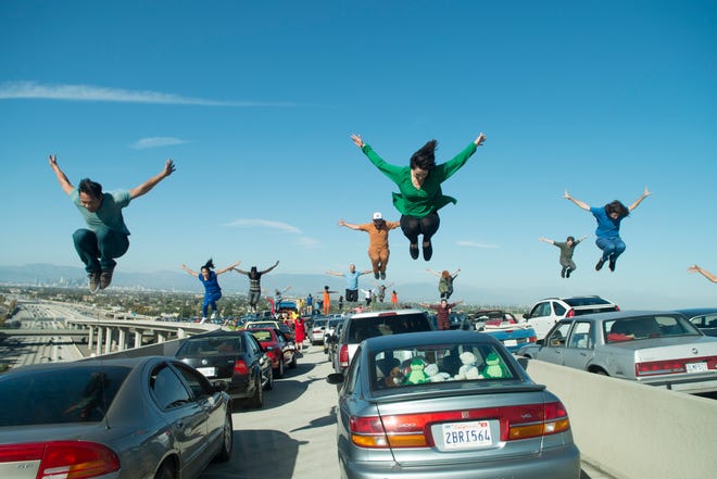 A cast-ful of characters go crazy with song and dance on an L.A. freeway. (Black Label Media)