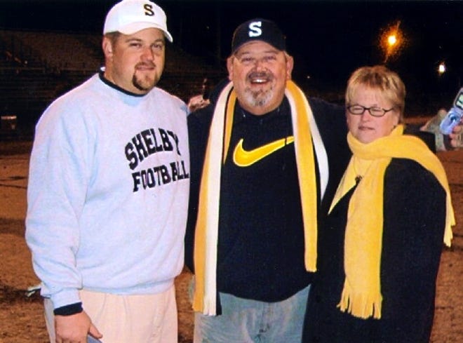 Shelby head coach Lance Ware, left, is shown with his late father, Larry, and mother, Linda. Lance Ware will coach the Golden Lions in their fourth consecutive state championship game Saturday. And as always, he'll coach with his father's love and support on his mind. Special to The Star