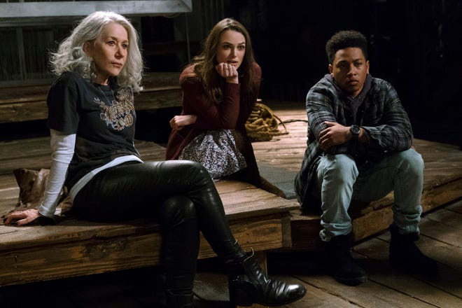 This image released shows Helen Mirren, from left, Keira Knightley and Jacob Latimore in a scene from "Collateral Beauty." (Barry Wetcher/Warner Bros. via AP)