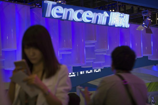 The strong dollar and other factors have pounded international equities, such as those of the Chinese internet giant Tencent. But if some experts are betting that emerging market stocks will bounce back. ASSOCIATED PRESS ARCHIVE