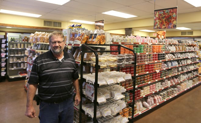 Yoder's Hometown Market owner, Mark Yoder, in the Dover store. (TimesReporter.com / Jim Cummings)