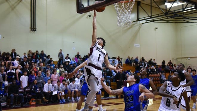 Bastrop’s Ethan Rodela lays the ball off the glass for two points. He led the Bears with 18 points against Connally. (Mike Valiska/For Bastrop Advertiser)