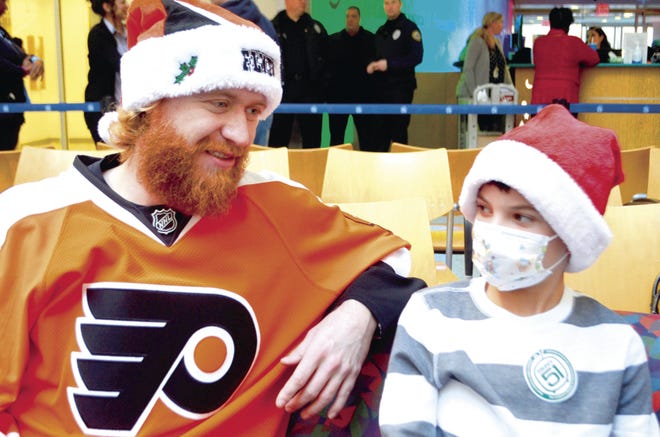 Flyers forward Jake Voracek talks some hockey with Jake Gregory, 12, of Ivyland, Pennsylvania, during the team's visit to Children's Hospital of Philadelphia on Tuesday, Dec. 20, 2016.
