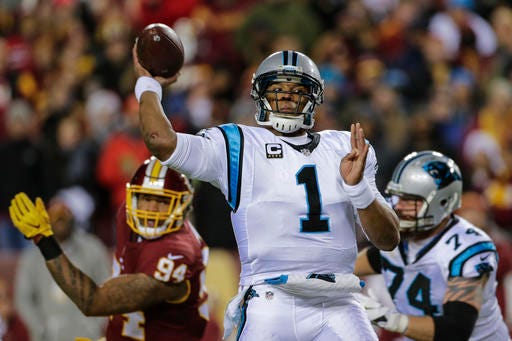 Carolina Panthers quarterback Cam Newton (1) passes the ball during the first half of an NFL football game against the Washington Redskins in Landover, Md., Monday, Dec. 19, 2016. (AP Photo/Mark Tenally)