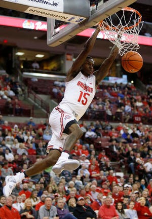 Ohio State guard Kam Williams dunks the ball against Youngstown State during the first half of an NCAA college basketball game in Columbus, Ohio, Tuesday, Dec. 20, 2016. (AP Photo/Paul Vernon)