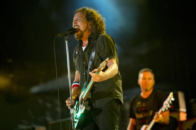 Photo by Drew Gurian/Invision/AP, File In this Sept. 2, 2012, file photo, Pearl Jam performs at the "Made In America" music festival in Philadelphia.